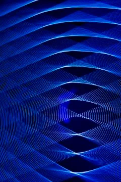 Abstract long exposure blurred light lines black and blue background. Geometric Stock Illustration