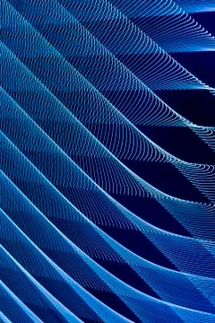 Abstract long exposure blurred light lines black and blue background. Geometric Stock Illustration