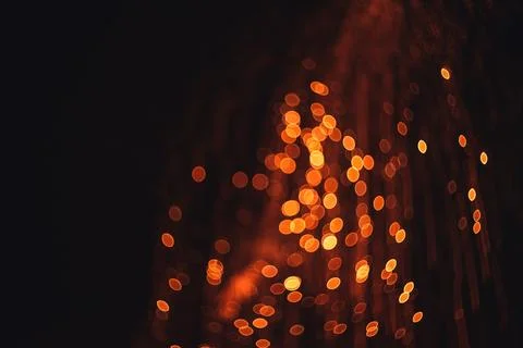 Abstract long exposure light streaks and glowing bokeh circles creating fes.. Stock Photos