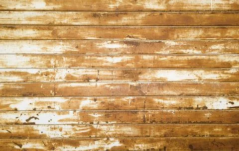 Abstract-looking background texture of a rusted and worn metal wall with para Stock Photos