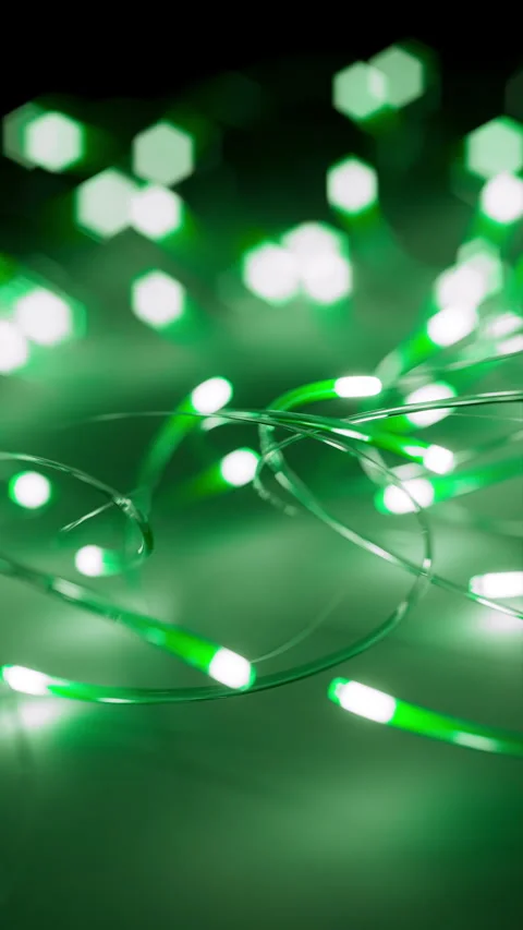Abstract looping of glowing neon lines with smooth motion and soft bokeh lights. Video stock 315968170