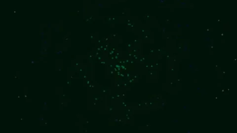 Abstract luminous green cosmic dust flow on deep black background Stock Footage 342115274
