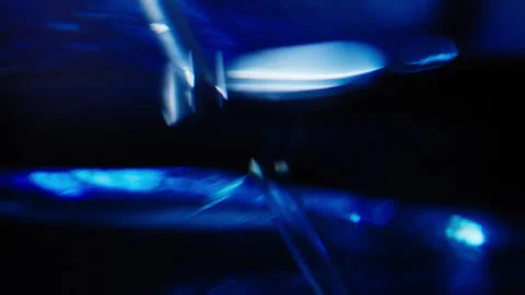 Abstract luxurious blue liquid perfume on a black background Stock Footage 345517338
