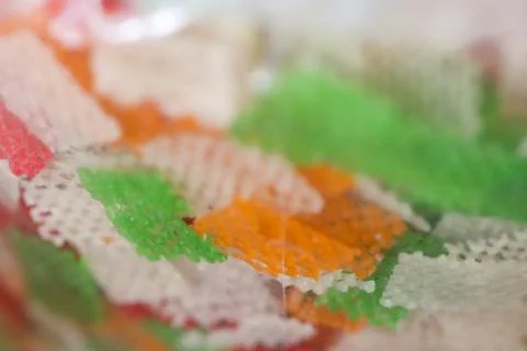 Abstract Macro Background of Colorful Raw Tapioca Crackers with Grid Textur.. Stock Photos