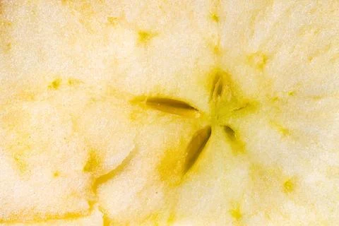 Abstract macro background texture of a thin fresh apple slice Stock Photos