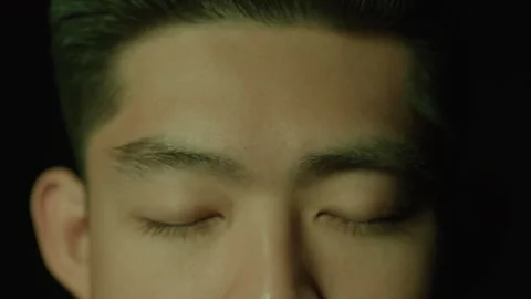 Abstract Macro Close-up of Colorful Studio Lights Reflecting over Diverse Young Stock Footage 270306293