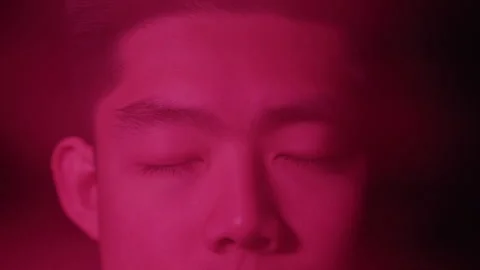 Abstract Macro Close-up of Colorful Studio Lights Reflecting over Diverse Young Stock Footage 270306467