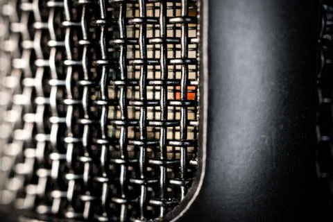 Abstract Macro Closeup of Large Diaphragm Condenser Microphone Grill and Caps Foto stock