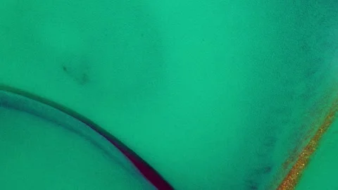 Abstract macro fluid art with shimmering swirling motion and diverse organic Stock Footage 331701590