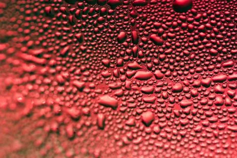 Abstract Macro of Red Water Bubbles on cold glass water bottle Stock Photos