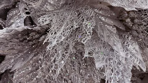 Abstract macro of silver glittery mesh fabric. Frozen lace Christmas decora.. Stock Photos