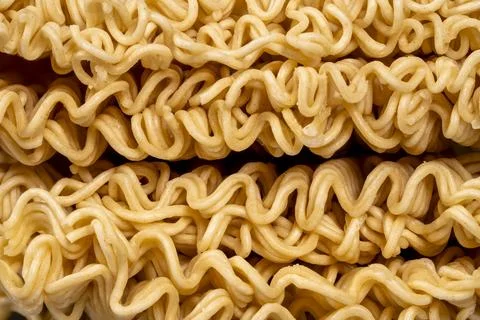 Abstract macro texture of dry ramen noodles Stock Photos