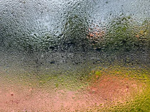 Abstract macro texture of natural condensation and water droplets on glass. Stock Photos