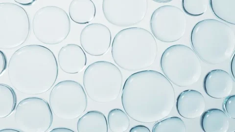 Abstract macro video of transparent blue water bubbles merging and expandin.. Video stock 332222316