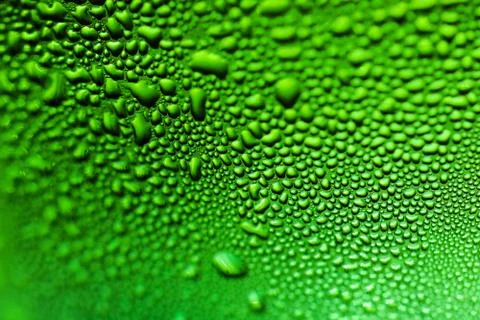 Abstract Macro view of Water Bubbles on wet green water bottle Stock Photos