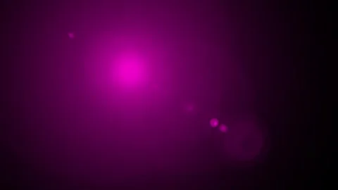 Abstract magenta glowing orb with light flares during cinematic motion on b.. Video stock 341664617