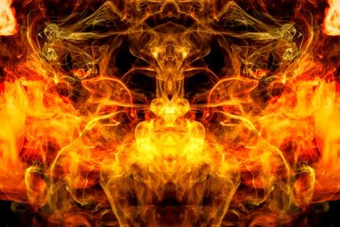 Abstract magic background. Cloud of  yellow and orange smoke in the form of a Stock Photos