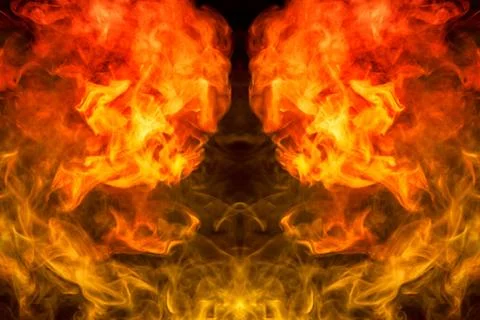 Abstract magic background. Cloud of  yellow and orange smoke in the form of a Stock Photos