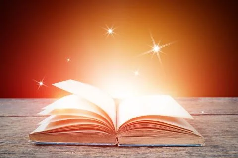 Abstract magic light on open book  for science and education or religion backgro Stock Photos