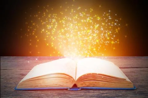 Abstract magic light on open book  for science and education or religion backgro Stock Photos