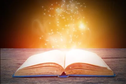 Abstract magic light on open book  for science and education or religion backgro Stock Photos