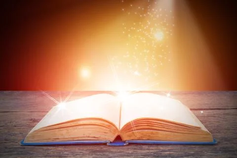 Abstract magic light on open book  for science and education or religion backgro Stock Photos