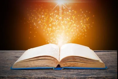 Abstract magic light on open book  for science and education or religion backgro Stock Photos