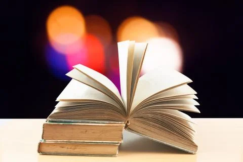Abstract magic light on open book  for science and education or religion backgro Stock Photos