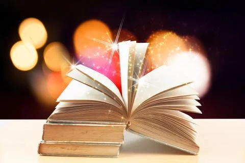 Abstract magic light on open book  for science and education or religion backgro Stock Photos