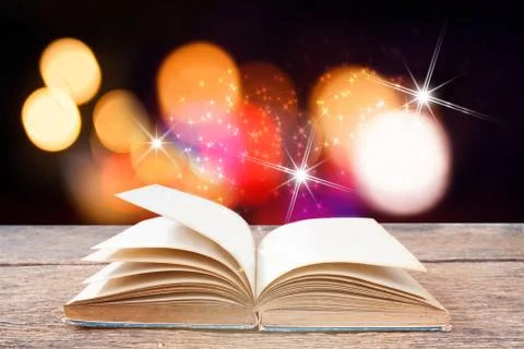 Abstract magic light on open book  for science and education or religion backgro Stock Photos