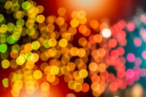 Abstract magical bokeh lights effect background, black, gold glitter for Chri Stock Photos