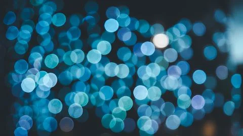 Abstract magical bokeh lights effect background, black, gold glitter for Chri Stock Photos