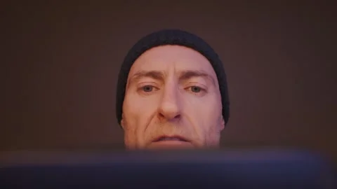 Abstract. Man using smart phone. Light reflected on his face. Hull.UK 2.1.2026 Stock Footage 327654972