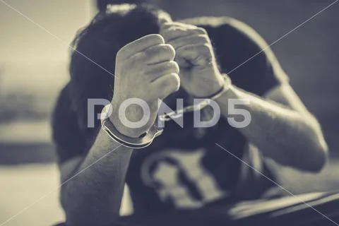 Abstract of the man was bound by hand in the shackle,human trafficking Stock Photos