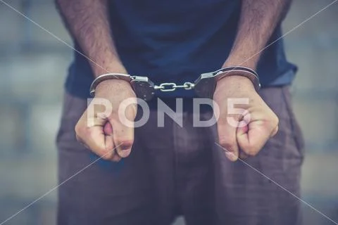 Abstract of the man was bound by hand in the shackle,human trafficking Stock Photos