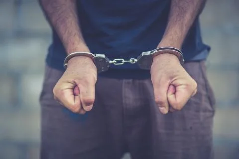 Abstract of the man was bound by hand in the shackle,human trafficking Stock Photos