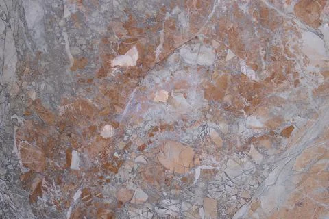 Abstract marble texture of exterior wall tiles. Copy space. Close-up Stock Photos