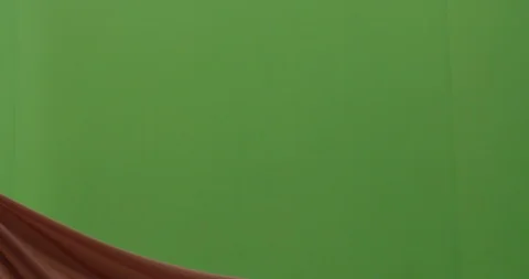 Abstract material floating cloth fabric against green screen in slow motion Stock Footage 104314935