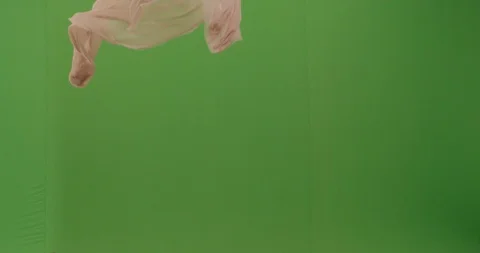 Abstract material floating cloth fabric against green screen in slow motion 스톡 동영상 104315359