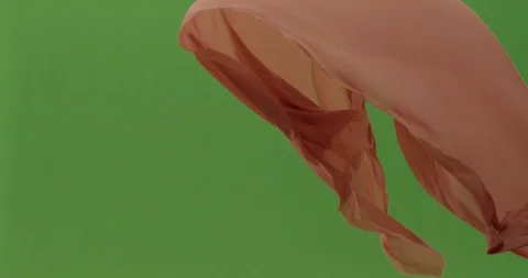 Abstract material floating cloth fabric against green screen in slow motion Stock Footage 104315934