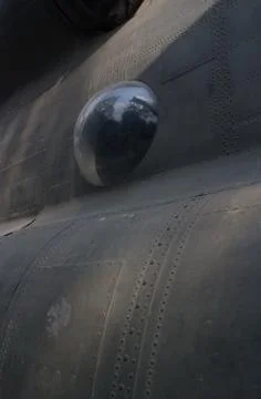 Abstract MCU of viewing bubble on captured US Army aircraft in Vietnam Stock Photos