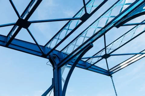 Abstract metal structures modern architectural building blue sky bridge light Stock Photos
