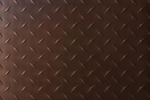 Abstract metal texture with diamond pattern. brown iron plate as background. Stock Photos