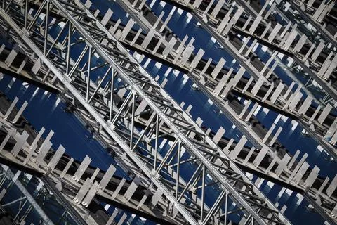 Abstract metal truss pattern with blue steel structure Stock Photos