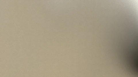 Abstract Metallic Grain Texture Background Loop with Subtle Light Stockbeeldmateriaal 329255064