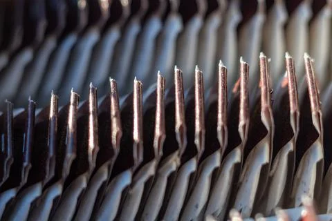 Abstract metallic structure with repetitive vertical lines and industrial Stock Photos