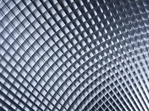 Abstract metallic texture with gradient light. Stock Photos