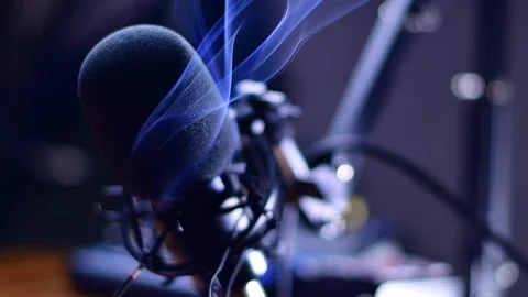 Abstract microphone selective focus smoke waves Stock Footage 257941170