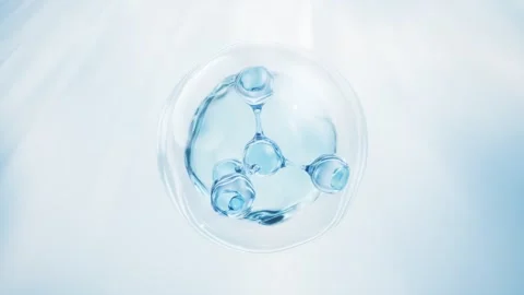 Abstract microscopic blue molecule rotating inside liquid drop for science .. Stock Footage 327249560