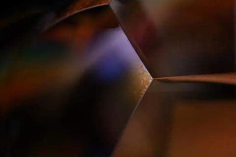 Abstract microscopic liquid geometry with golden and violet reflections Stock Photos